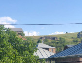 Հողատարածք կիսակառույց շինությամբ